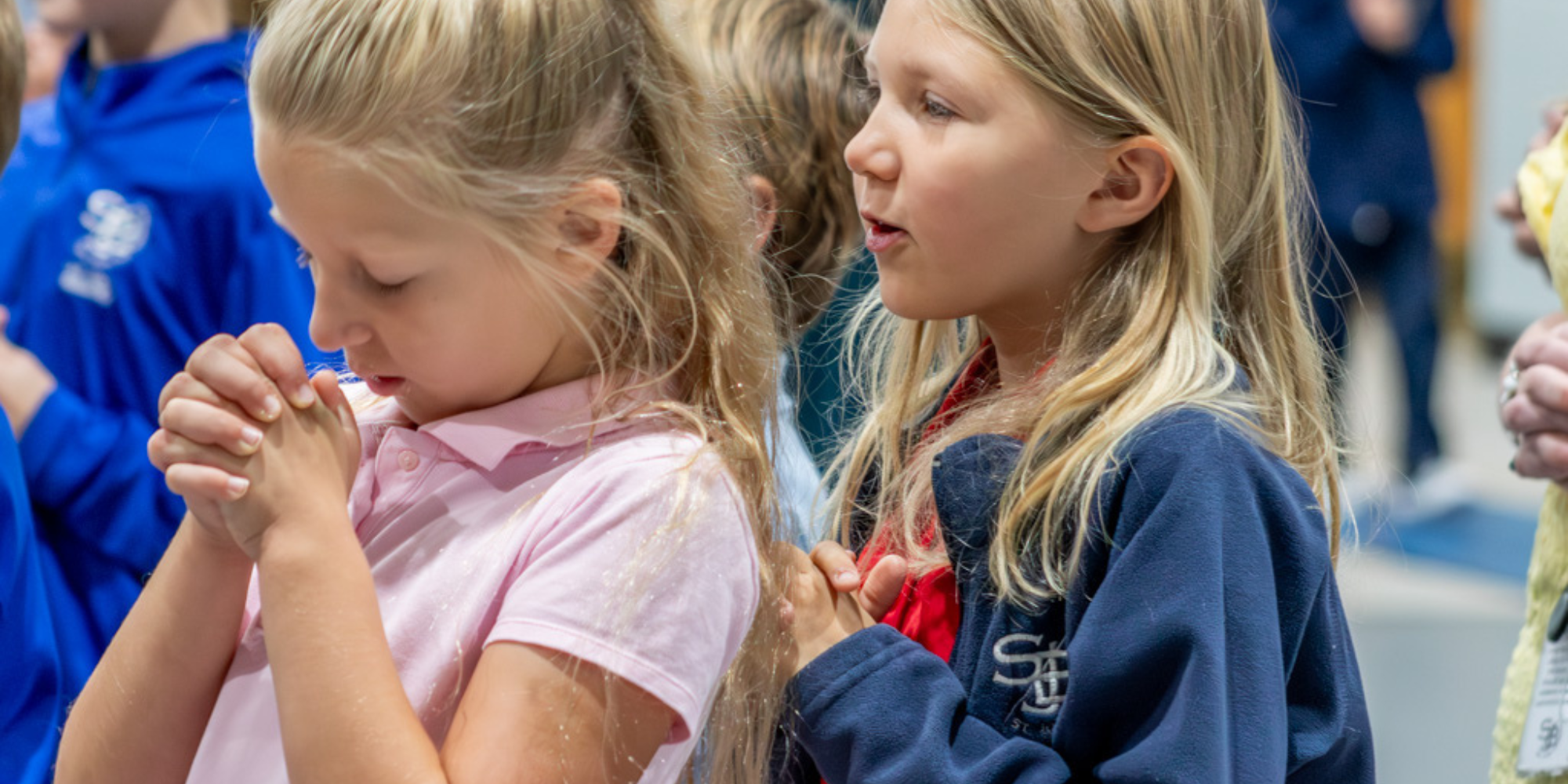 SJB students praying